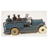 1190	ANTIQUE CAST IRON KENTON TOYS PATROL TRUCK W/4 REMOVABLE POLICE FIGURES, APPROXIMATELY 9 1/2 IN