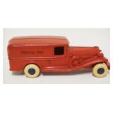 1192	ANTIQUE CAST IRON TOY VAN MARKED CHAMPION, APPROXIMATELY 8 IN LONG X 3 IN HIGH