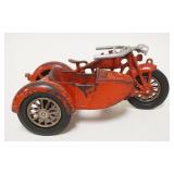1194	ANTIQUE CAST IRON HUBLEY TOY MOTORCYCLE W/SIDE CAR, NO FIGURES, APPROXIMATELY 9 IN X 4 IN HIGH