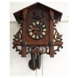 1019	ANTIQUE CUCKOO CLOCK, APPROXIMATELY 5 IN X 13 IN X 16 IN HIGH
