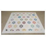 1033	HAND SEWN QUILT 6 POINT STAR PATTERN, APPROXIMATELY 7 FT 4 IN X 6 FT 7 IN