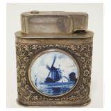 1139	LARGE SILVERPLATE LIGHTER W/DELFT INSET MEDALIONS, APPROXIMATELY 4 IN HIGH
