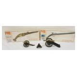 1162	LOT INCLUDING 2 VINTAGE SEALED PISTOL KITS, CAST METAL CANONS & CANON BALLS, 2 MARKED WEST POIN