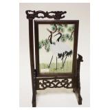 1182	MINIATURE ASIAN SILK SCREEN IN GLASS ROTATING FRAME W/FRETWORK WOOD STAND, APPROXIMATELY 14 IN 