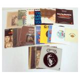 1043	LOT OF 45 RPMS INCLUDES ROLLING STONES, CARPENTERS, WINGS, SAM COOKE, THE CHIFFONS, FATS DOMINO