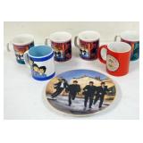 1048	LOT OF COLLECTIBLE BEATLES MUGS & DECORATIVE PLATE 8 1/2 IN