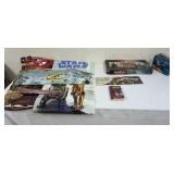 1082	STAR WARS LOT INCLUDING PIZZA HUT POSTERS, MONOPOLY GAME AND LUNCH BOX. BOX HAS DENT IN UPPER L