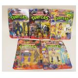 1160	FIVE TEENAGE MUTANT NINJA TURTLES ACTION FIGURES NEW ON CARDS. PLAYMATES  RANGE FROM 1989-1992