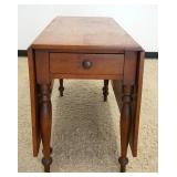 1090	ANTIQUE SOLID CHERRY DROP LEAF TABLE W/ONE DRAWER & LONG DROPS, APPROXIMATELY OPEN 63 IN X 46 I