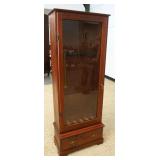 1114	PINE GUN CABINET W/DRAWER AT BASE, APPROXIMATELY 25 IN X 13 IN X 65 IN HIGH