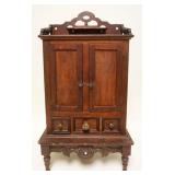 1130	ANTIQUE WALNUT MINIATURE CABINET, 2 DOORS, 3 DRAWERS, APPROXIMATELY 10 IN X 18 IN X 31 IN HIGH