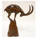 1134	WOOD CARVING OF A RAM ON ROCK LEDGE, APPROXIMATELY 13 IN HIGH