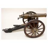 1135	SCALE MODEL OF A GATLING GUN HARTFORD CONN W/MECHANICAL ACTION, APPROXIMATELY 15 IN LONG X 8 IN