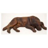 1138	ANTIQUE WOOD CARVING OF DOG W/GLASS EYES, RESTING, APPROXIMATELY 7 IN X 1 1/2 HIGH