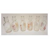 1166	LOT OF 6 ANTIQUE MILK BOTTLES, *BABY FACE*