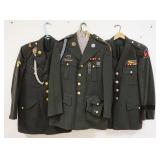 1183	LOT OF US MILITARY COATS/CLOTHING INCLUDES COAT 41S W/PANTS, COAT W/PANTS & HAT SIZE UNKNOWN, &