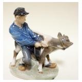 1245	ROYAL COPENHAGEN FIGURINE OF BOY PULLING COW, APPROXIMATELY 7 IN H