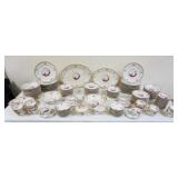 1013	LIMOGES DINNERWARE SET W/SCENES DEPICTING A MAN FISHING W/A WOMEN ON RIVERSIDE