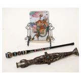 1101	LOT OF SMALLS INCLUDING 2 ORNATE CIGARETTE HOLDERS & SMALL ASIAN PLAQUE IN STAND