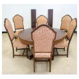1163	ROUND MAHOGANY TABLE W/2 SKIRTED LEAVES & 6 UPHOLSTERED SIDE CHAIRS, TABLE APPROXIMATELY 54 IN