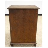 1215	OAK VICTROLA CABINET STAND, ONE DOOR, APPROXIMATELY 22 IN X 18 IN X 32 IN HIGH