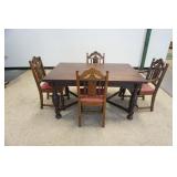 1252	OAK ENGLISH TUDOR TABLE W/PULL OUT EXTENSION & 4 NEEDLEPOINT SEAT CHAIRS, TABLE APPROXIMATELY 6