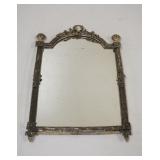 1260	MIRROR IN ORNATE METAL FRAME, MISSING BACK HINGED STAND, APPROXIMATELY 10 IN X 17 IN