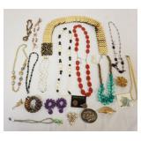 1265	LOT OF ASSORTED COSTUME JEWELRY