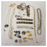 1268	LOT OF ASSORTED COSTUME JEWELRY