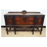 1001	JACOBEAN STYLE SIDEBOARD WITH 2 DOORS AND 2 CENTER DRAWERS, APPROXIMATELY 66 IN X 22 IN X 43 IN
