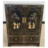 1010	20TH CENTURY ASIAN BLACK LACQUERED 2 DOOR, 2 DRAWER CABINET WITH APPLIED CARVED STONE & MOTHER 