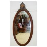 1021	MAITLAND SMITH OVAL MIRROR WITH FLOWER BASKET CARVED CREST, APPROXIMATELY 24 IN X 47 IN