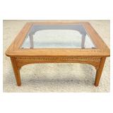 1027	OAK COFFEE TABLE W/INSET BEVELED GLASS TOP, APPROXIMATELY 36 IN X 17 IN HIGH