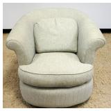 1034	BETTER HOMES AND GARDENS UPHOLSTERED SWIVEL CLUB CHAIR