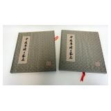 1087	PR OF ASIAN EMBROIDERED WALL PLAQUES	PAIR OF EMBROIDERED ASIAN WALL PLAQUES IN ORIGINAL BOXES, 