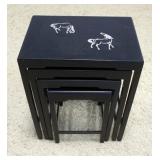 1129	NEST OF 4 BLACK LACQUERED TABLES	NEST OF 4 BLACK LACQUERED TABLES WITH INLAID METAL HORSE DESIG