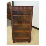 1148	OAK ONE DOOR CURIO CABINET	OAK ONE DOOR CURIO CABINET, APPROXIMATELY 29 IN X 15 IN X 56 IN HIGH