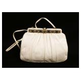1197	BEAUTIFUL JUDITH LEIBER WHITE LEATHER EVENING BAG	JUDITH LEIBER WHITE LEATHER EVENING BAG, APPR