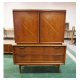 1002	MIDCENTURY MODERN UNITED FURNITURE CO TALL CHEST W/LATTICE WORK INLAID DOUBLE DOORS CONCEALING 