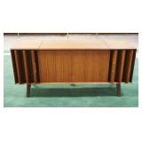 1004	MIDCENTURY MODERN WALNUT STEREO CONSOLE W/UNUSUAL CANTILEVER DOORS FOR SPEAKERS ZENITH, NO TURN