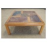 1038	DANISH MODERN COCKTAIL TABLE W/INSET STONE TOP, APPROXIMATELY 41 IN SQUARE X 17 IN HIGH