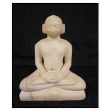 1056	CARVED STONE MONK MEDITATING, APPROXIMATELY 9 IN HIGH