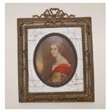 1066	MINIATURE PORTRAIT IN BRASS FRAME, APPROXIMATELY 6 IN X 7 1/2 IN