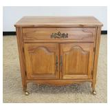 1130	FRENCH PROVINCIAL OAK ONE DRAWER 2 DOOR STAND, APPROXIMATELY 33 IN X 19 IN X 33 IN HIGH