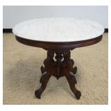 1147	WALNUT VICTORIAN OVAL MARBLE TOP PARLOR TABLE, APPROXIMATELY 34 IN X 25 IN X 30 IN HIGH