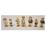 1184	LOT OF 7 HUMMEL FIGURES, LARGEST APPROXIMATELY 5 1/4 IN