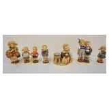 1186	LOT OF 7 HUMMEL FIGURES, LARGEST APPROXIMATELY 5 1/2 IN