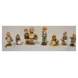 1187	LOT OF 7 HUMMEL FIGURES, LARGEST APPROXIMATELY 6 IN