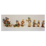 1190	LOT OF 7 HUMMEL FIGURES, LARGEST APPROXIMATELY 6 IN