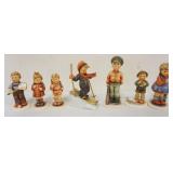 1191	LOT OF 7 HUMMEL FIGURES, LARGEST APPROXIMATELY 5 IN